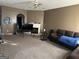 Spacious living room featuring a fireplace and plenty of seating at 20 Sw Pine Canyon Sw Dr, Atlanta, GA 30331