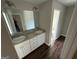 Double vanity bathroom with a separate toilet area at 385 Mcgiboney Ln, Covington, GA 30016