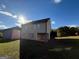 Back of house with patio and spacious yard at 385 Mcgiboney Ln, Covington, GA 30016