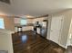Kitchen with white cabinets, granite countertops, and stainless steel appliances at 385 Mcgiboney Ln, Covington, GA 30016