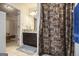 This bathroom boasts a modern vanity with granite countertop and is right off the main bedroom at 546 Paden Dr, Lawrenceville, GA 30044