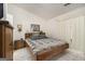 Comfortable bedroom with tiled flooring, ensuite bathroom, and ample natural light at 546 Paden Dr, Lawrenceville, GA 30044