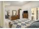 Spacious bedroom featuring tiled floors, ensuite bathroom, and closet at 546 Paden Dr, Lawrenceville, GA 30044