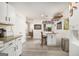 Open kitchen with granite counters, breakfast bar, and stainless steel appliances at 546 Paden Dr, Lawrenceville, GA 30044