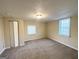 Bright bedroom with neutral walls and carpet, featuring a closet at 1876 Flat Shoals Se Rd, Atlanta, GA 30316