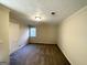Spacious bedroom with neutral decor, carpet, and ample natural light at 1876 Flat Shoals Se Rd, Atlanta, GA 30316