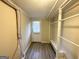 Convenient laundry area with built-in shelving and exterior access at 1876 Flat Shoals Se Rd, Atlanta, GA 30316