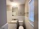 Clean bathroom, granite countertop vanity, updated fixtures, and a shower at 3721 W Potomac Dr, East Point, GA 30344