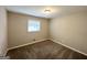 Simple bedroom with neutral wall paint and carpeted floor at 3721 W Potomac Dr, East Point, GA 30344