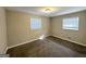 Bright bedroom with neutral walls and carpeted floors at 3721 W Potomac Dr, East Point, GA 30344