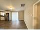 Dining area with hardwood floors and access to the kitchen at 3721 W Potomac Dr, East Point, GA 30344
