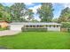 Ranch style home with attached garage and well-manicured lawn at 3721 W Potomac Dr, East Point, GA 30344