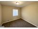 Spacious bedroom with neutral walls and new carpet at 2729 Pinella Sw Dr, Atlanta, GA 30331