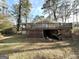 Ranch house with a large deck and a spacious backyard at 2729 Pinella Sw Dr, Atlanta, GA 30331