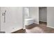 Simple bathroom with white sink and brown floor at 5324 Tolar Rd # 28, South Fulton, GA 30213