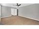 Simple bedroom with ceiling fan and neutral decor at 5324 Tolar Rd # 28, South Fulton, GA 30213
