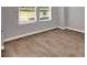 Interior room with brown flooring and white baseboards at 5324 Tolar Rd # 28, South Fulton, GA 30213