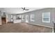 Open living room with kitchen and neutral tones at 5324 Tolar Rd # 28, South Fulton, GA 30213