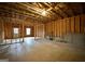 Unfinished basement with exposed framing at 1134 Abundance Dr, Locust Grove, GA 30248