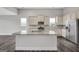 Modern kitchen with granite countertops and white cabinets at 1134 Abundance Dr, Locust Grove, GA 30248