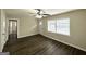 Spacious living room featuring hardwood floors and updated door at 306 Ard Nw Pl, Atlanta, GA 30331