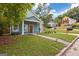 Charming blue home with a manicured lawn and inviting front walkway at 1302 Ladd St, Atlanta, GA 30310
