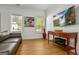 Inviting living room with natural light and a stylish mounted television at 1302 Ladd St, Atlanta, GA 30310