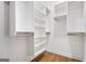 Walk-in closet with custom shelving and rod for hanging clothes at 1302 Ladd St, Atlanta, GA 30310