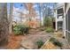 Landscaped backyard with mature trees and shrubs at 3509 Billingsley Dr, Marietta, GA 30062