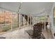 Spacious screened porch with string lights, ceiling fan, and stamped concrete floor at 3509 Billingsley Dr, Marietta, GA 30062