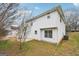 View of house exterior and backyard, showcasing a patio at 9507 Byrom Rd, Jonesboro, GA 30236