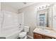 Bathroom with single vanity and bathtub at 9507 Byrom Rd, Jonesboro, GA 30236
