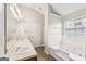 Bathroom with double vanity, soaking tub and separate toilet at 9507 Byrom Rd, Jonesboro, GA 30236