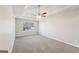 Large bedroom with carpet flooring and ceiling fan at 9507 Byrom Rd, Jonesboro, GA 30236