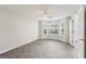 Bright bedroom with bay window and tile floors at 9507 Byrom Rd, Jonesboro, GA 30236