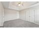 Bright bedroom with carpet and double doors at 9507 Byrom Rd, Jonesboro, GA 30236