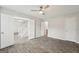 Spacious bedroom with tile floors and ceiling fan at 9507 Byrom Rd, Jonesboro, GA 30236
