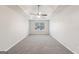 Large bedroom with carpet flooring and ceiling fan at 9507 Byrom Rd, Jonesboro, GA 30236