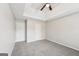 Bedroom with carpet, ceiling fan, and window at 9507 Byrom Rd, Jonesboro, GA 30236