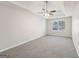 Large bedroom with carpet flooring and ceiling fan at 9507 Byrom Rd, Jonesboro, GA 30236