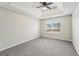 Bedroom with carpet, ceiling fan, and window at 9507 Byrom Rd, Jonesboro, GA 30236