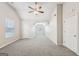 Spacious bedroom with vaulted ceiling and carpet at 9507 Byrom Rd, Jonesboro, GA 30236