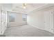 Spacious bedroom with carpet and ceiling fan at 9507 Byrom Rd, Jonesboro, GA 30236
