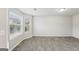 Bright dining room with bay window and tile floors at 9507 Byrom Rd, Jonesboro, GA 30236