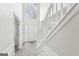 Two-story entryway with a staircase and large window at 9507 Byrom Rd, Jonesboro, GA 30236