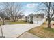 Brick two-story house with a two-car garage and landscaped yard at 9507 Byrom Rd, Jonesboro, GA 30236