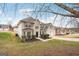 Two-story house with a front yard and walkway leading to the entrance at 9507 Byrom Rd, Jonesboro, GA 30236