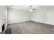 Living room featuring a fireplace and ceiling fan at 9507 Byrom Rd, Jonesboro, GA 30236