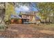 Brick home with a large backyard, deck, and screened porch at 960 Todd Dr, Covington, GA 30014