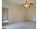 Spacious bedroom with ceiling fan and carpet flooring at 960 Todd Dr, Covington, GA 30014